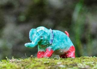 Pottery Elephant 35234 is one of a large set of glazed ceramic elephant sculptures in very vivid colours. Very unusual creations by Max Bullock.